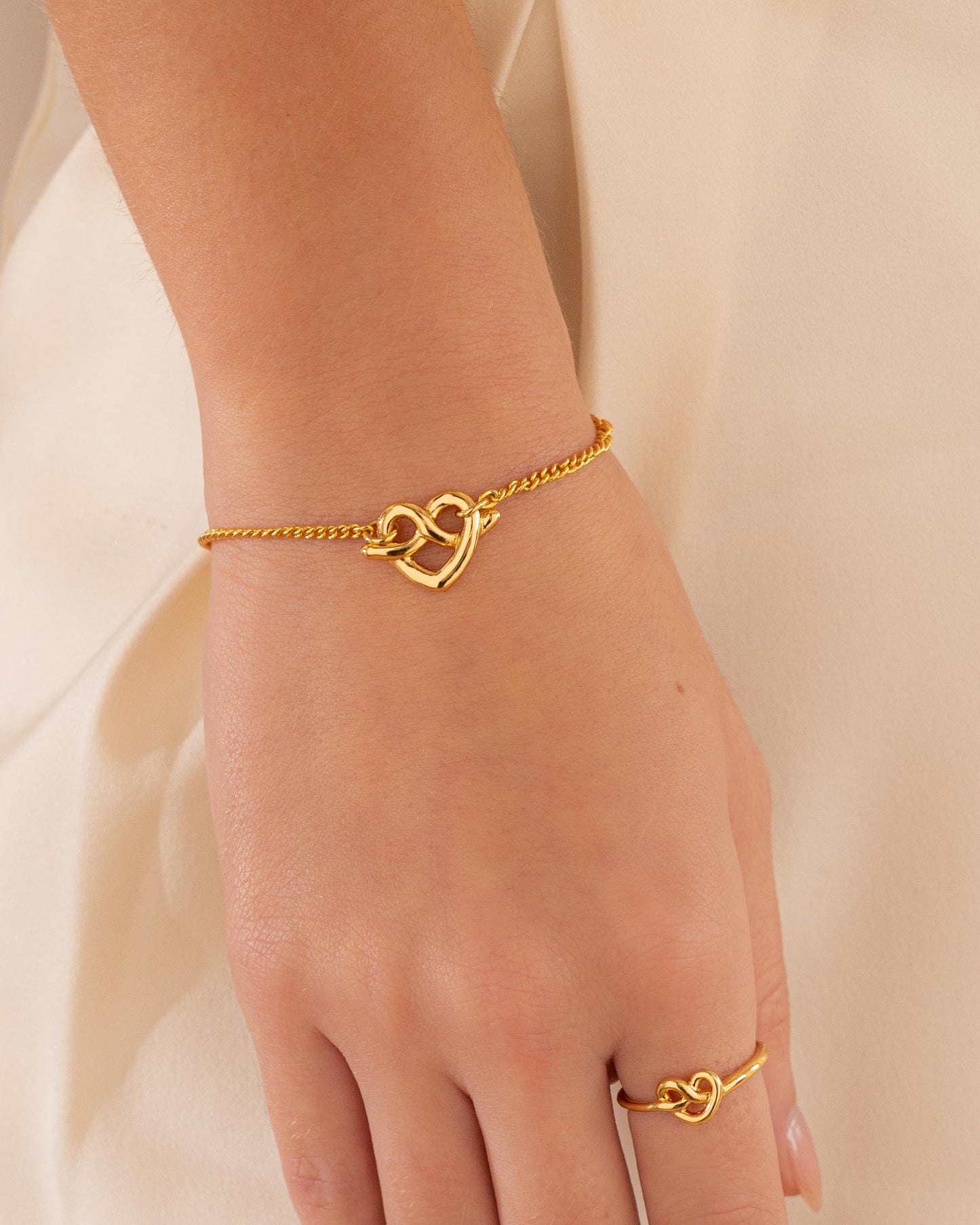 Pulsera Cadena Corazón Lazo + Aretes