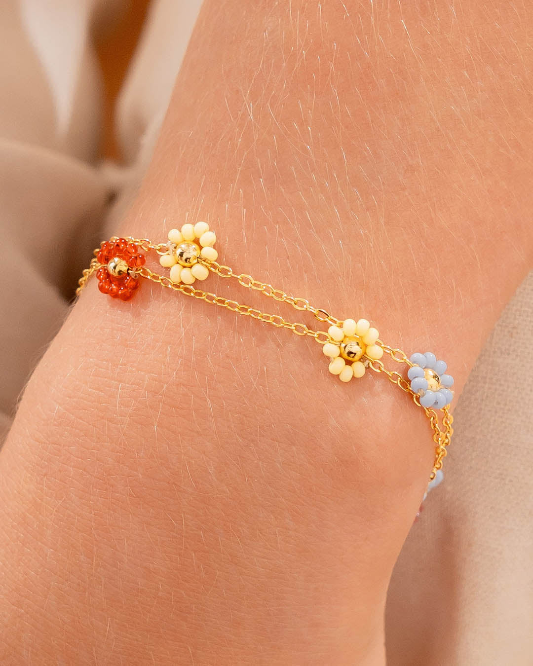 Pulsera Flores Multicolor + Aretes